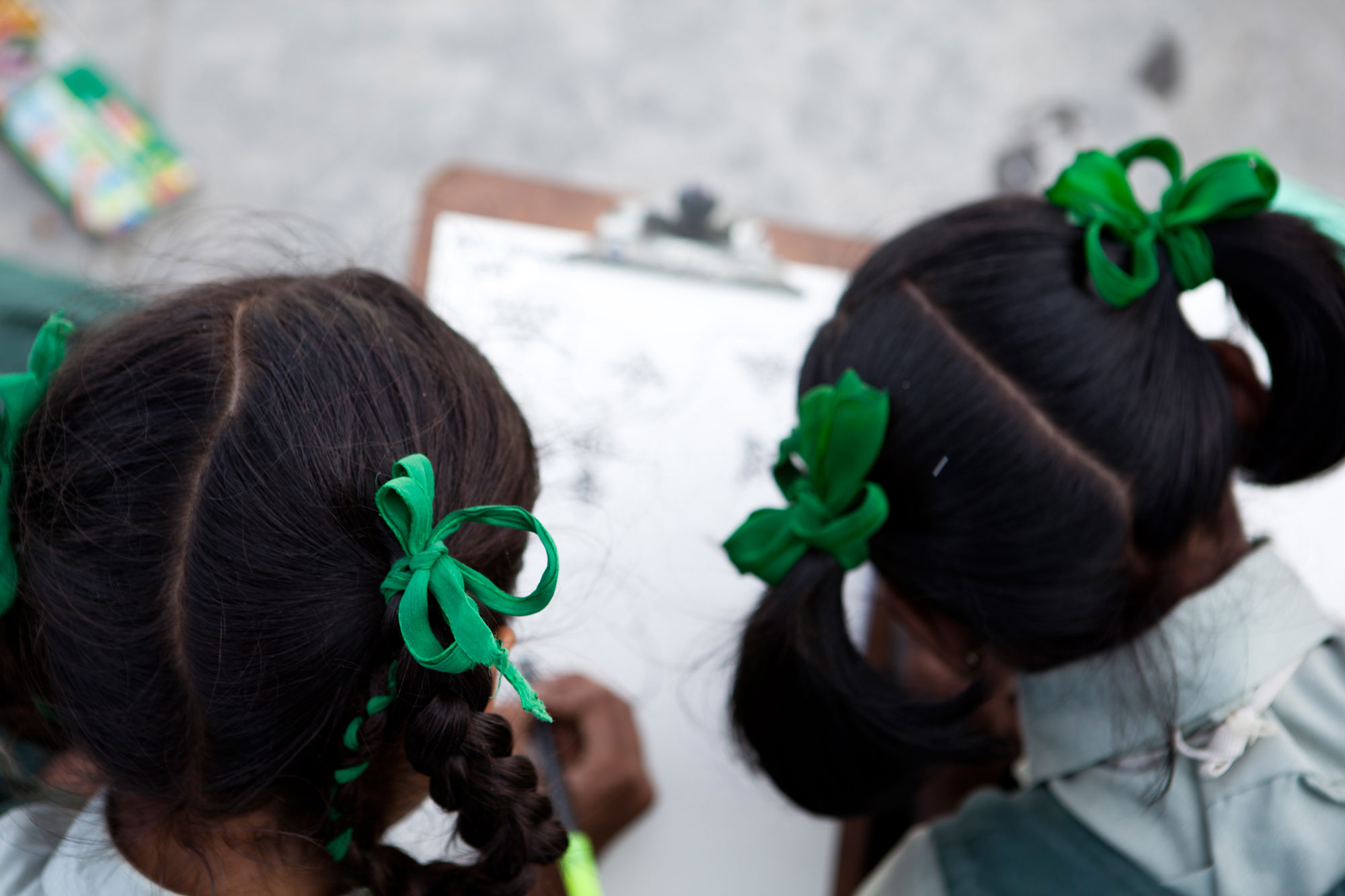 close up of girls' heads in school-affordable private schools
