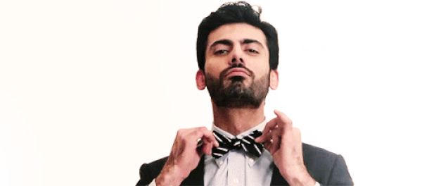 Fawad Khan adjusting his bow tie