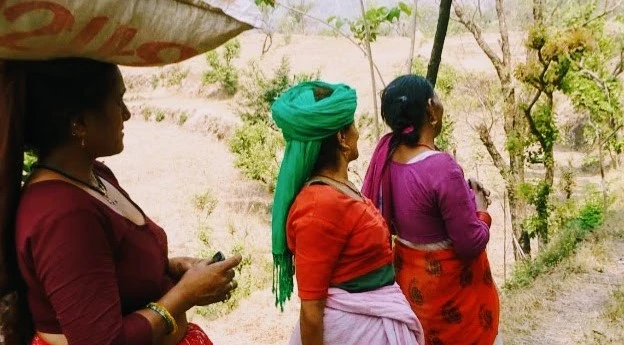 Three women in a forest close up