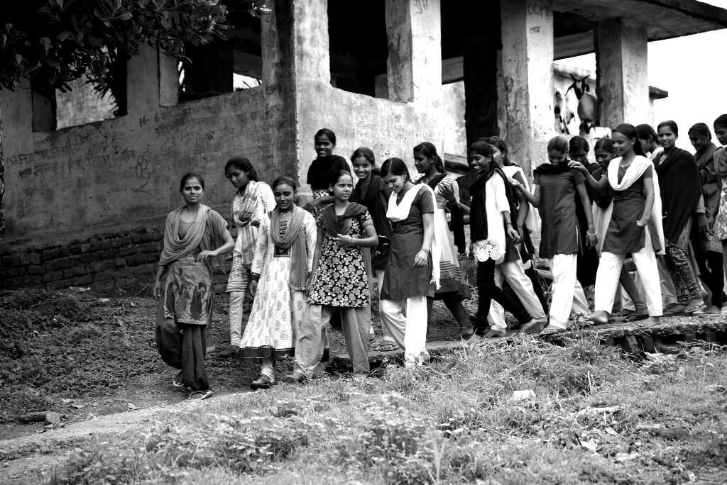 Funding advocacy_Girls walking in a school