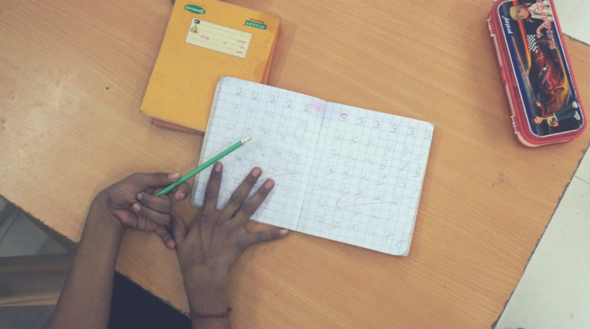 Disabled child with notebook