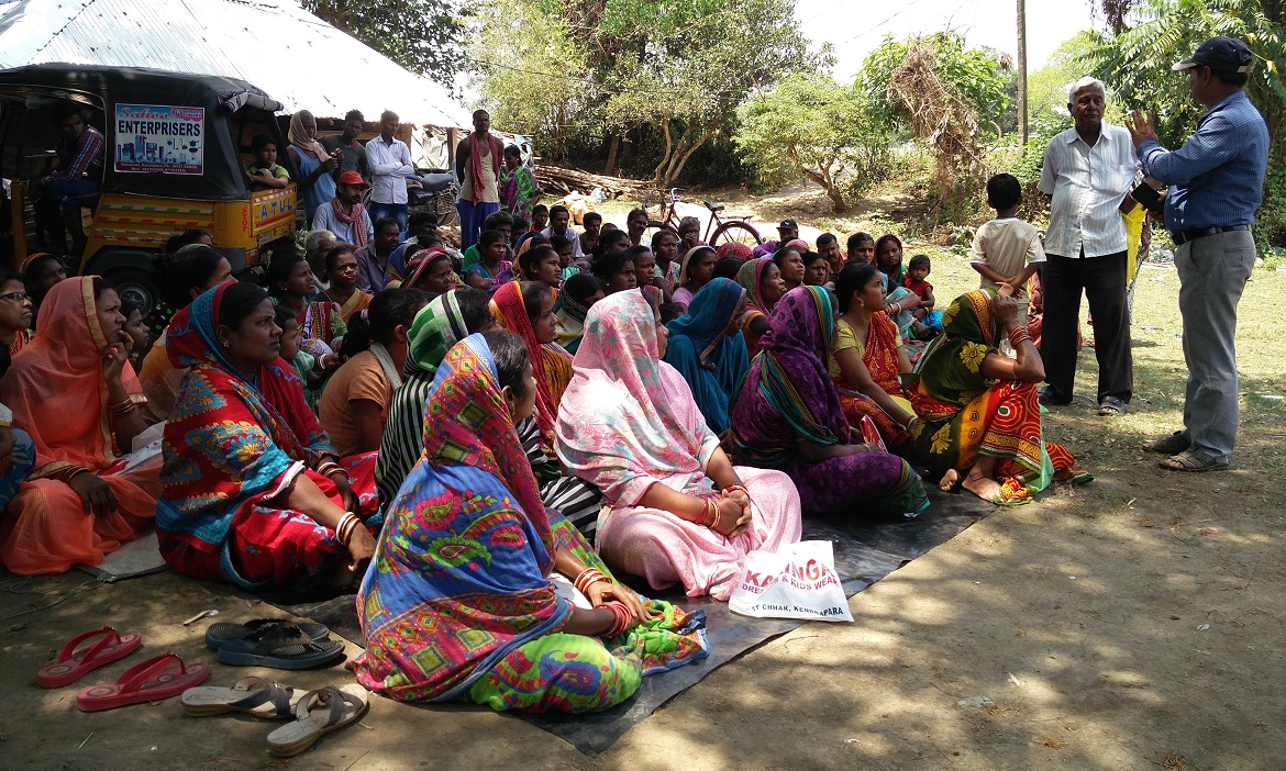 A group of villagers having a discussion