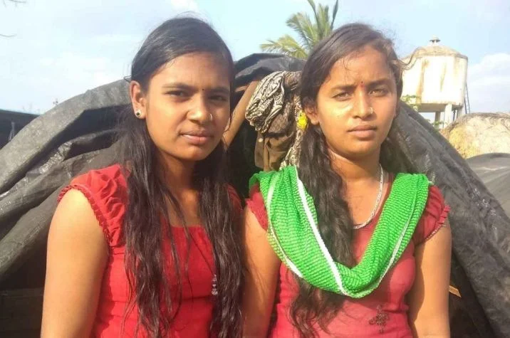 Maheswari and Kavita standing side by side