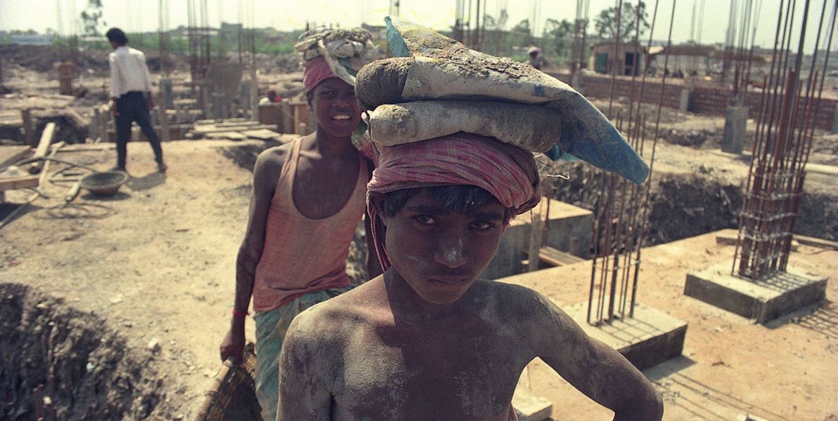 children working on a construction site