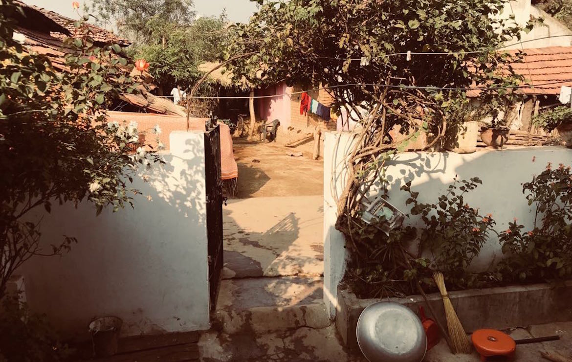 an entrance to village homes