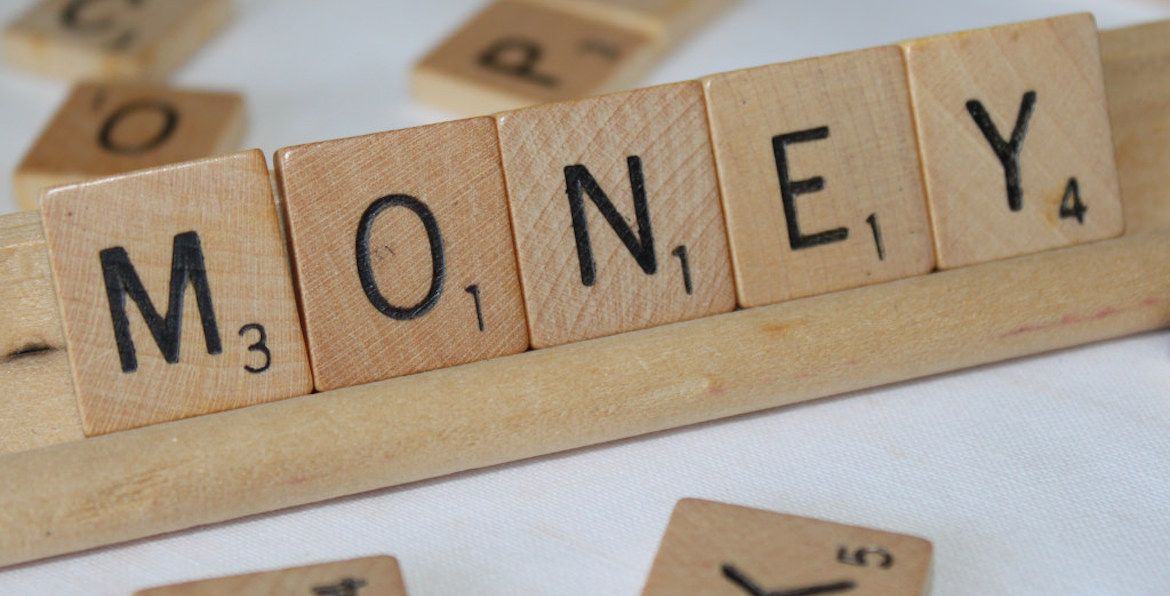 Scrabble letters spelling out the word money