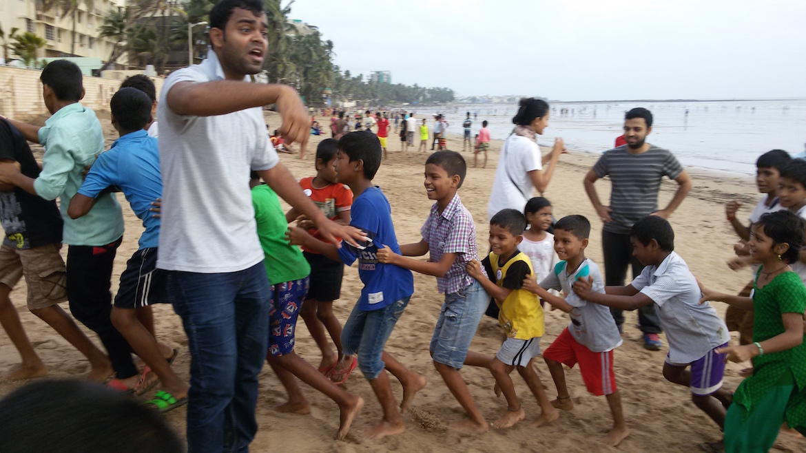 Children playing a game on the beach