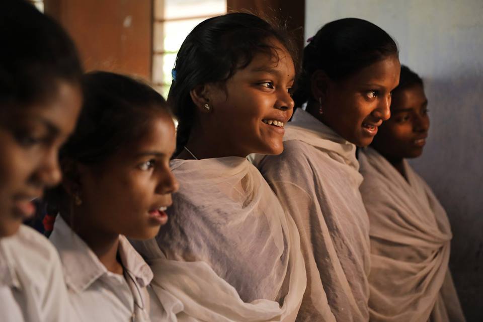 five young girls in line-adolescents