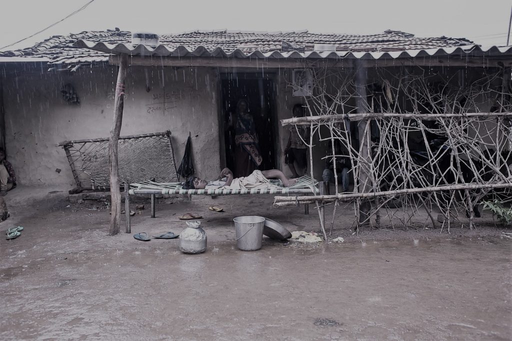 a sick child lying on a cot_VRatanjee_GroundUp