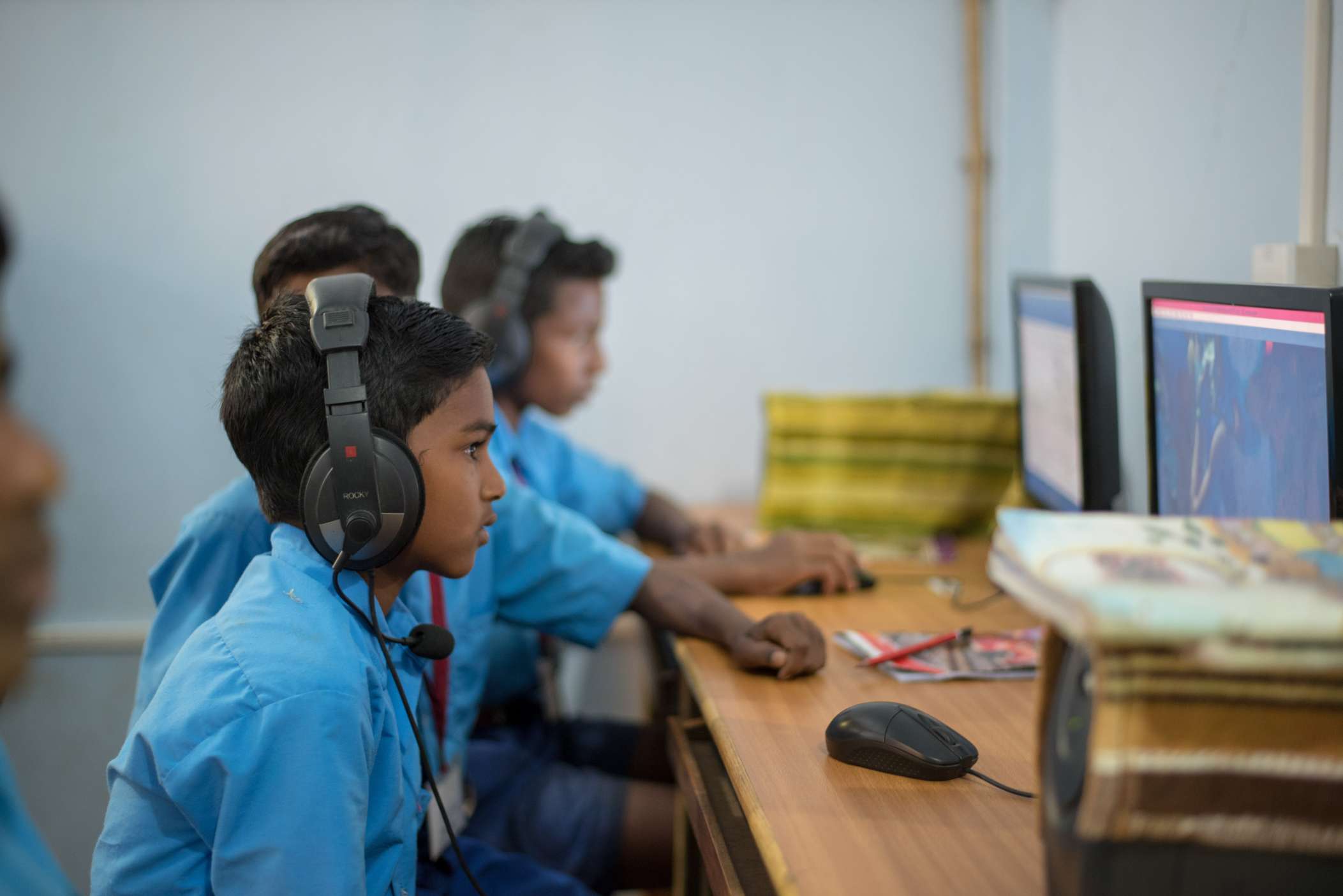 a student with headphones_edtech_ajaya