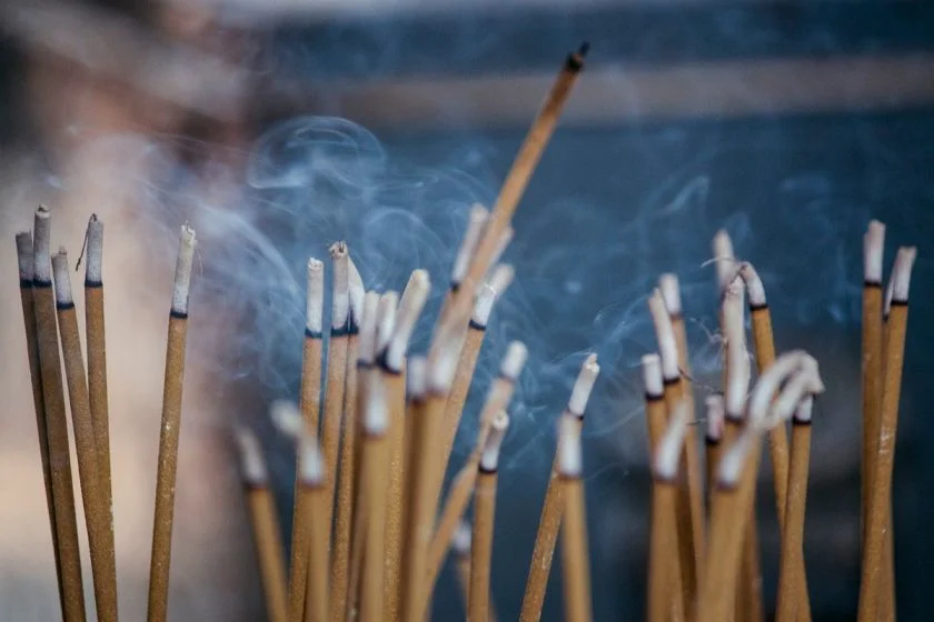 Close up of burning incense sticks