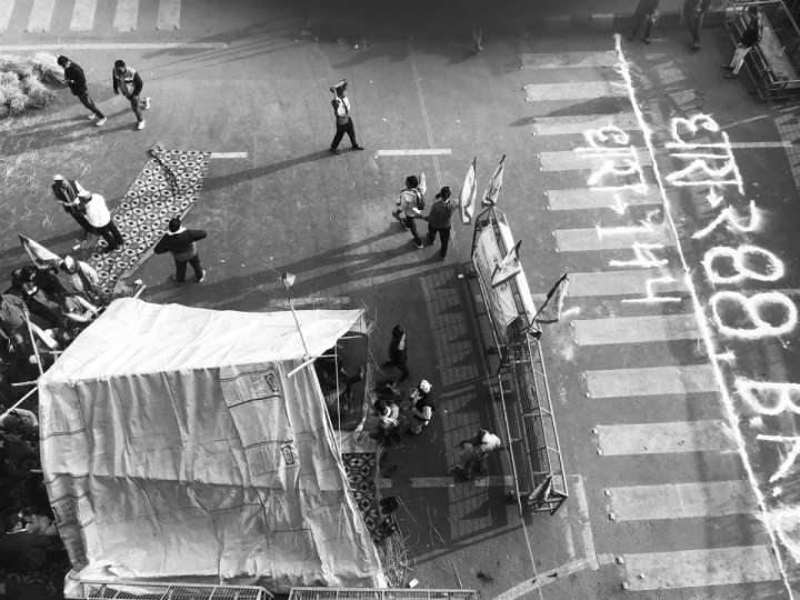 Tents on the road people walking on the streets-farmers protest