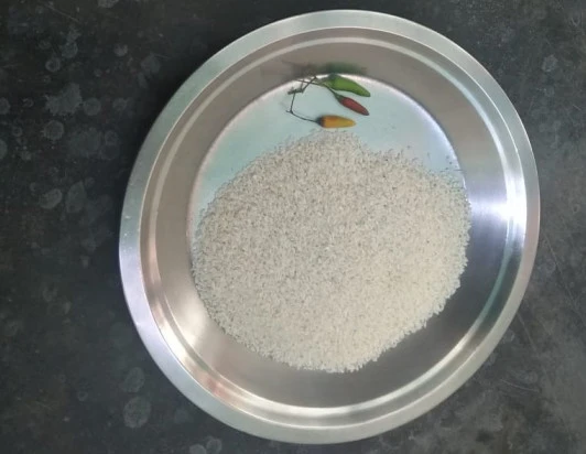 A plat of rice and chillies