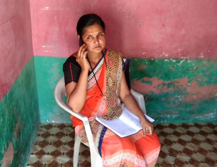 lakshmi on the phone-grassroots leader