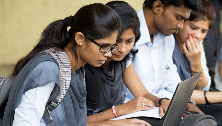 Indian students using laptop