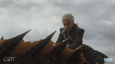 Daenerys Targeryan from Game of Thrones riding her dragon Drogon