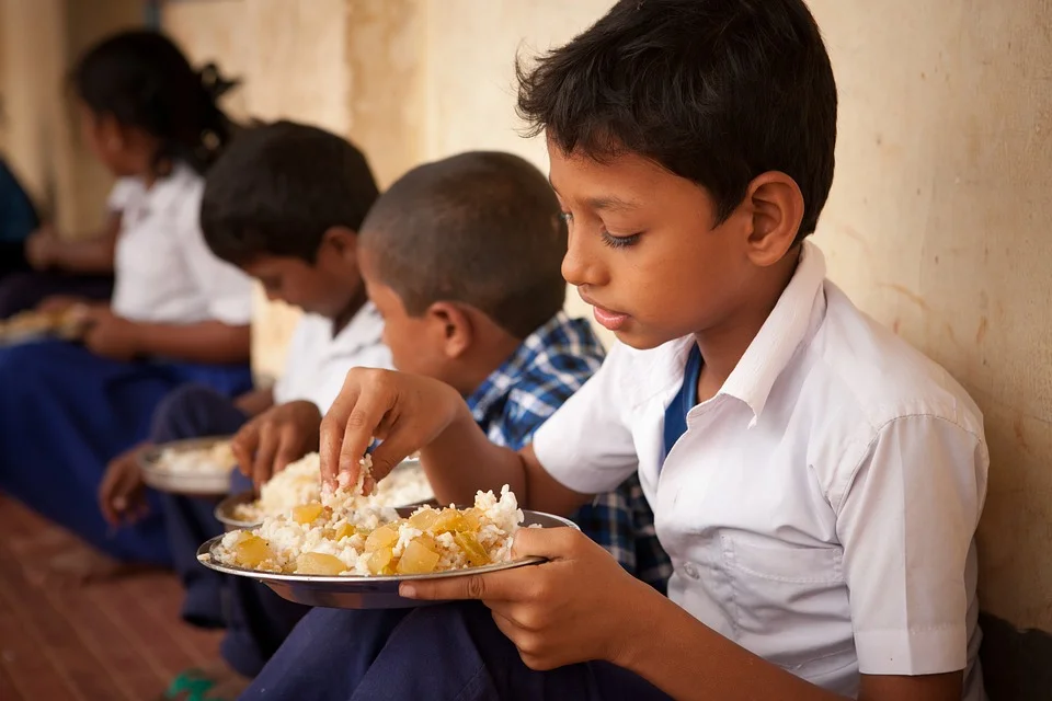 Anganwadi kids eating their mid-day meals