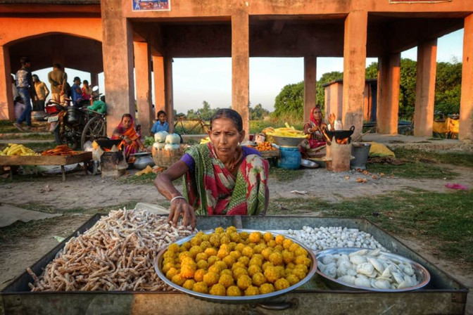 Woman vendor selling food in a market