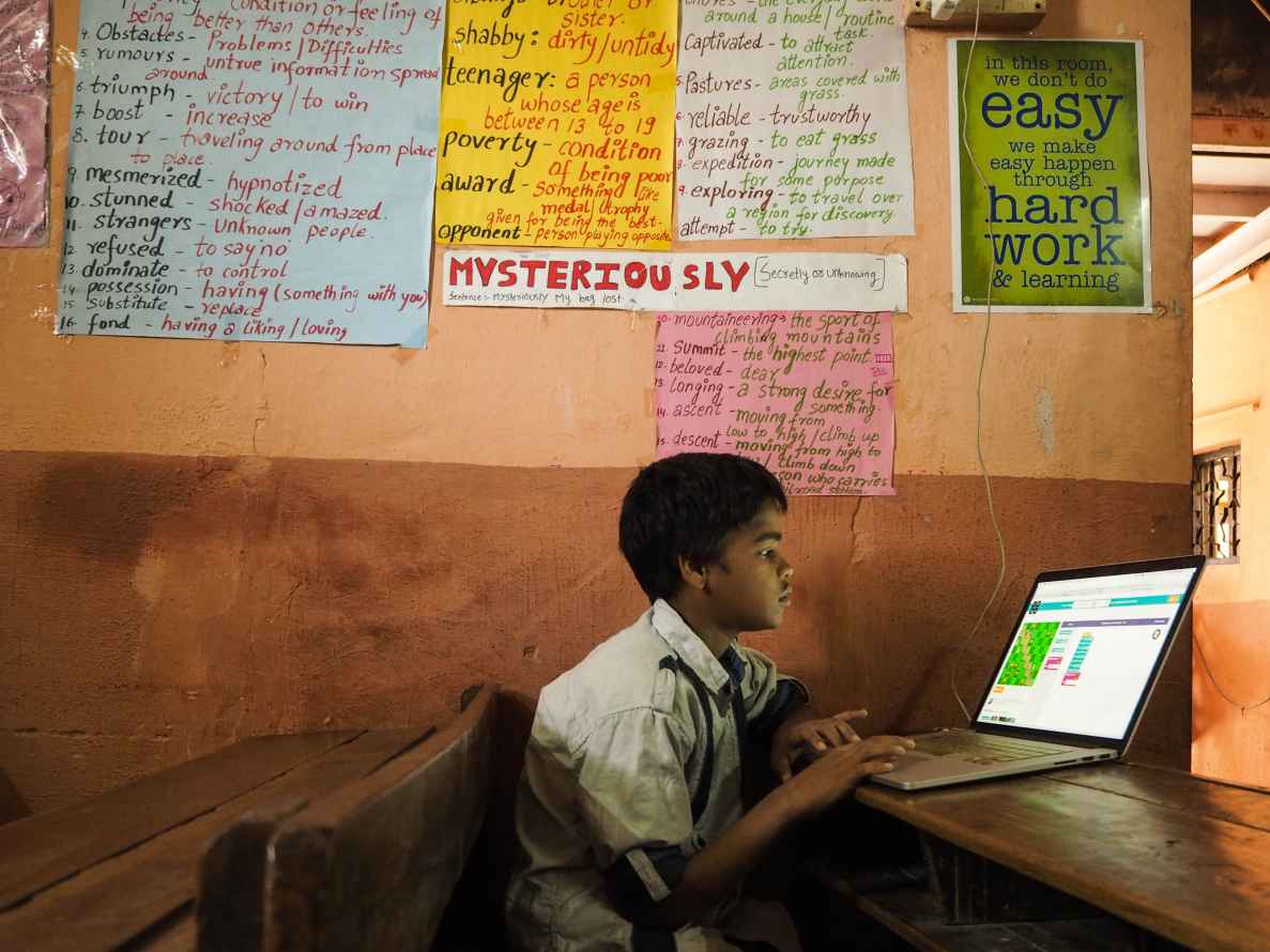 Student sitting in a classroom with a laptop-EdTech Policy
