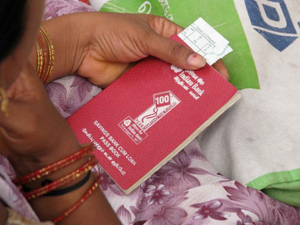 Woman holding a passbook-women empowerment