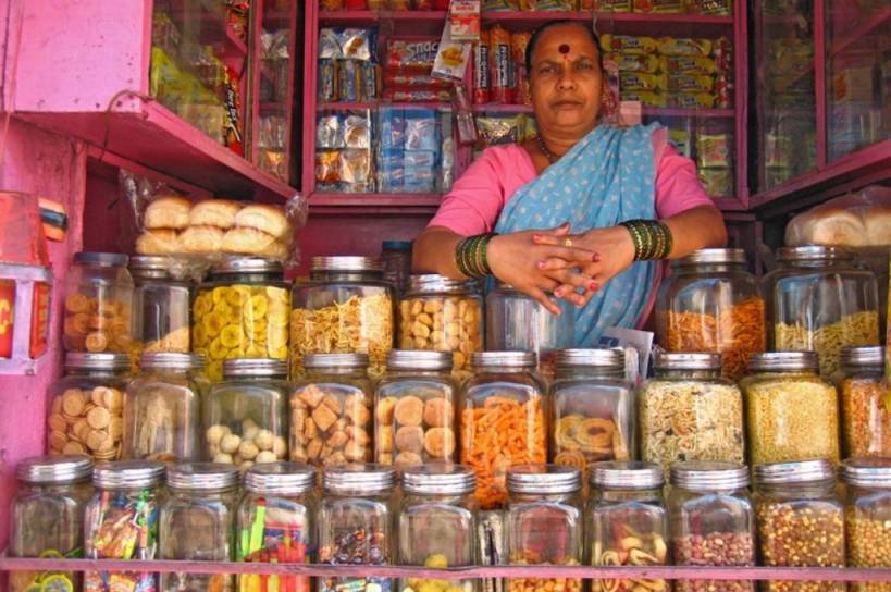 woman selling snacks at a shop-overnutrition