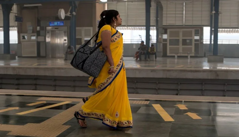 women-walking-on-the-platform-at-delhi-metro-urban employment scheme_picture courtesy flickr