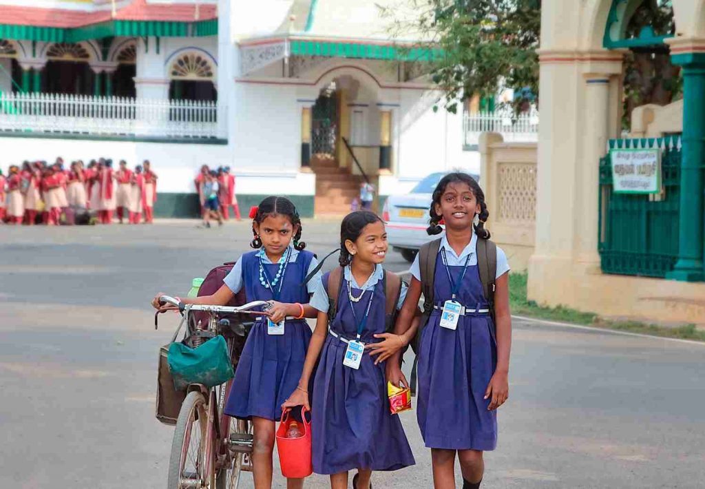 Three girls in primary school uniforms walking together_ Picture courtesy-Flickr