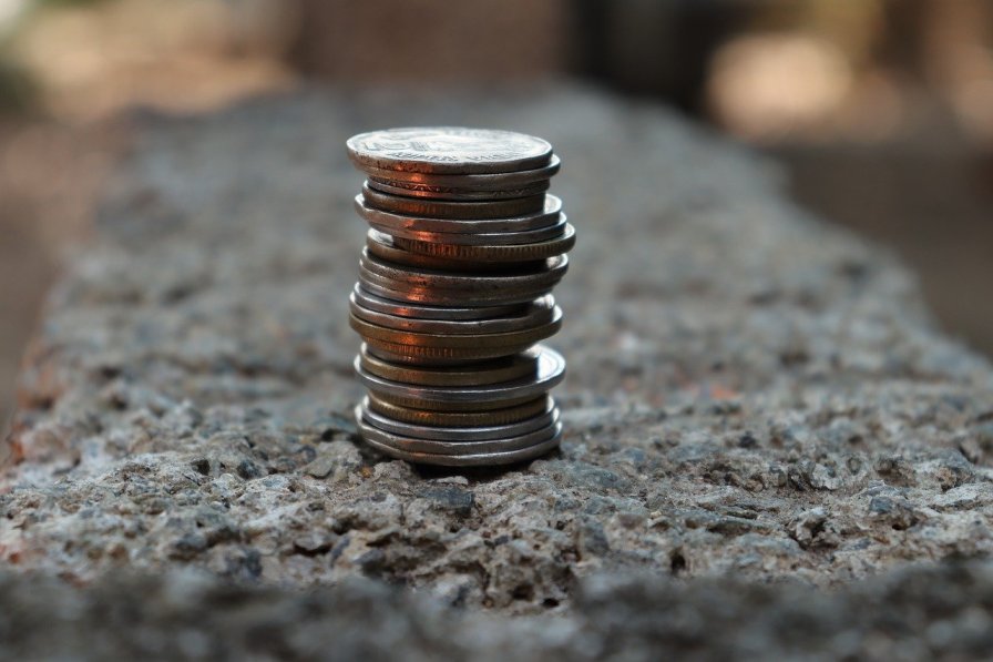 A stack of coins-savings low-income families