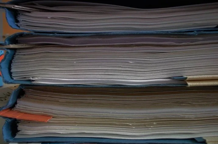 Stack of files with papers-FCRA