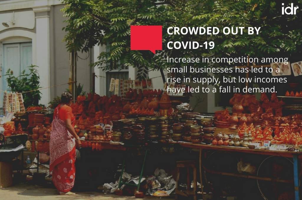 background of a woman shopping from a street vendor. Text overlaid on the image reads "Crowded out by COVID-19. Increase in competition among street vendors has led to a rise in supply, but low incomes have led to a fall in demand."-street vendor in Bihar