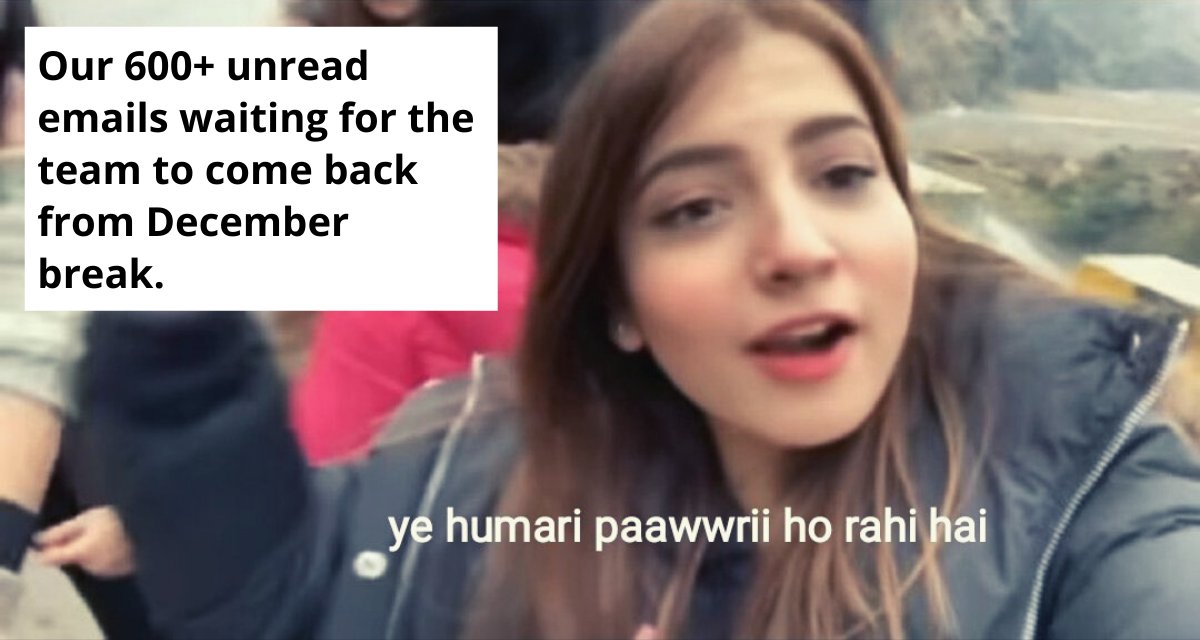 an image of a woman wearing a black jacket. She is looking at the camera while waving her right hand-nonprofit humour