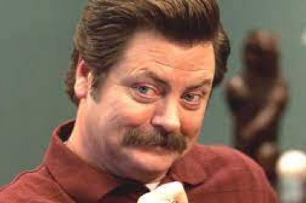 A still of Ron Swanson from Parks and Recreation used in the article titled Convincing your parents that your social impact career was not a mistake
