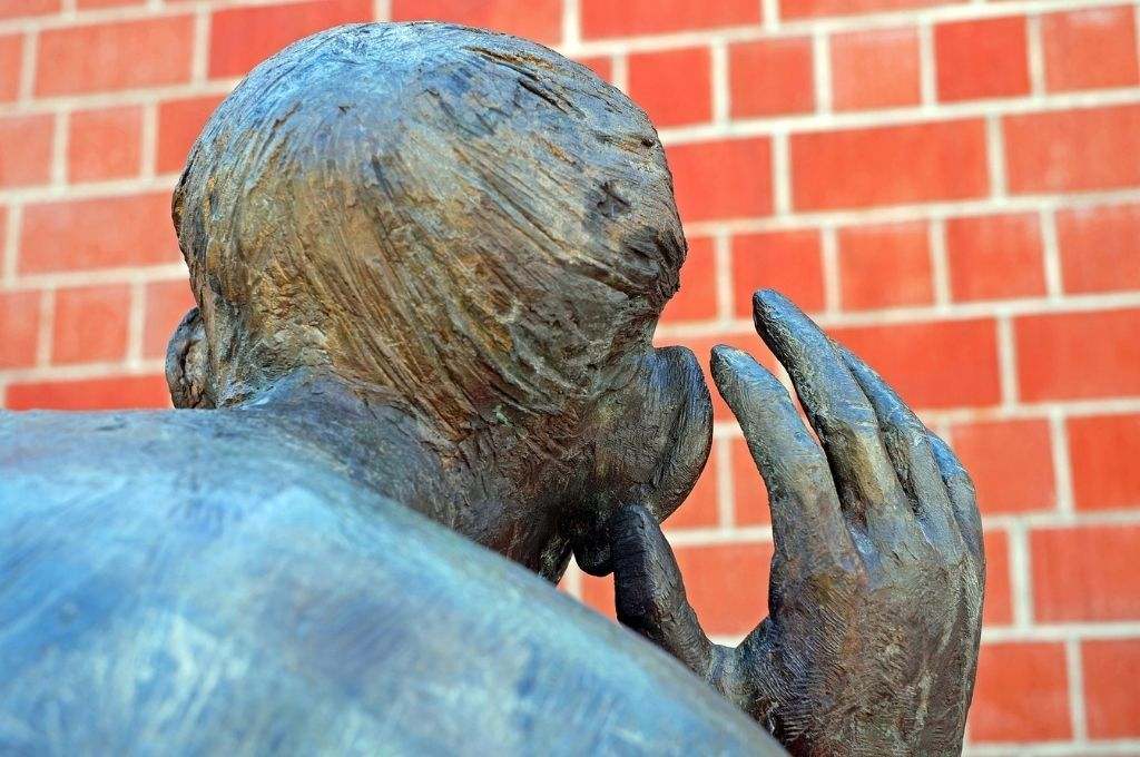 close up of a sculpture eavesdropping