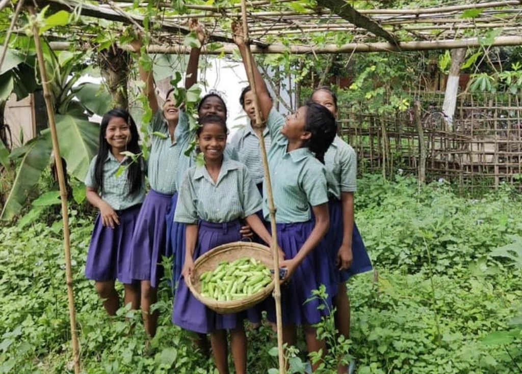 Girls in a vegetable garden in Assam
