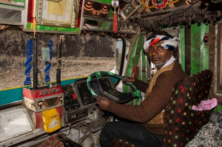 Kebal Singh, a truck driver at the Ghazipur landfill near New Delhi, in his truck-waste management