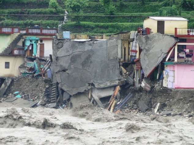 buildings and roads washed away during a flood