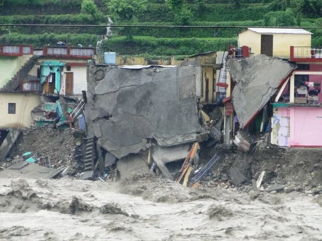buildings and roads washed away during a flood-climate change