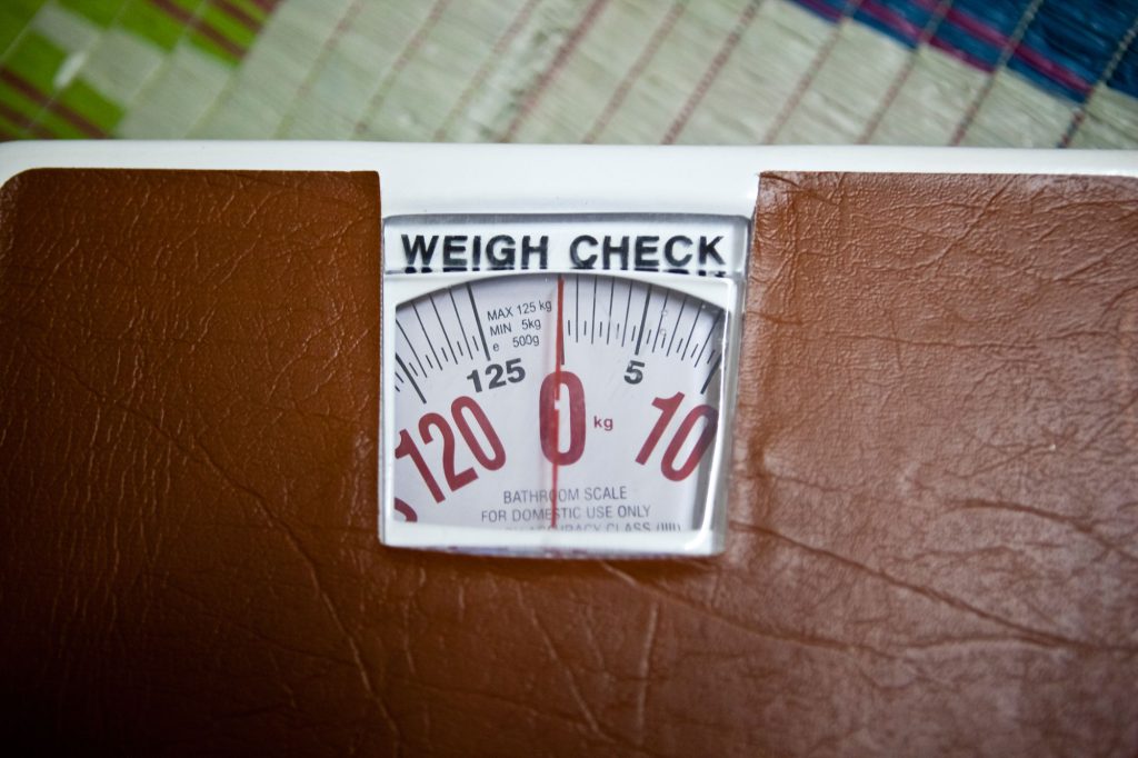 Close-up of weighing scale-malnutrition