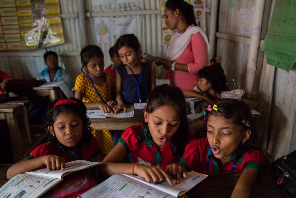 young girls reading in class - NEP 2020