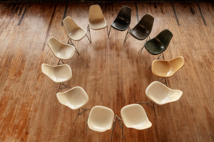 empty chairs arranged in a circle - governance