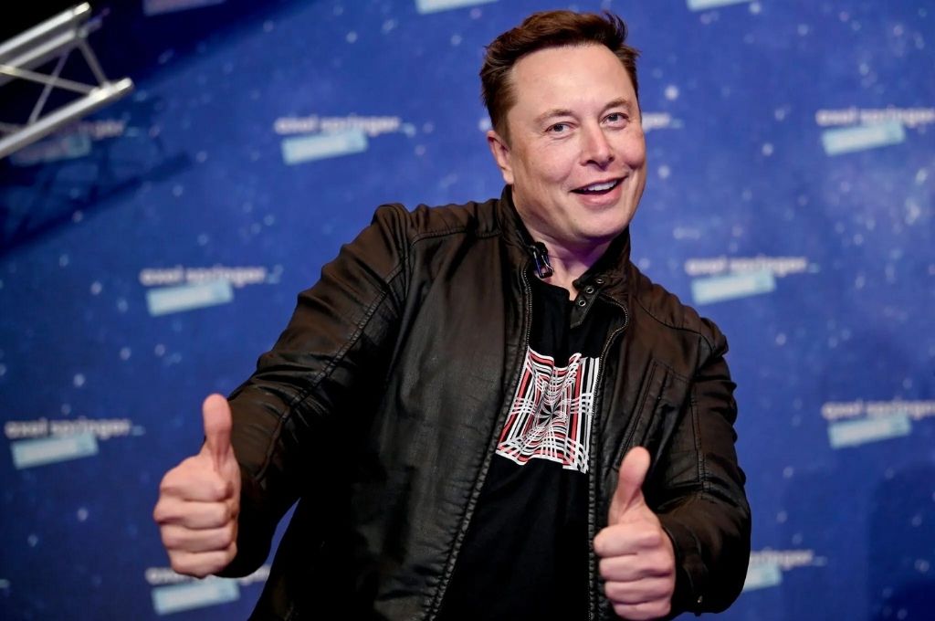 Elon Musk making a thumbs up gesture_nonprofit humour
