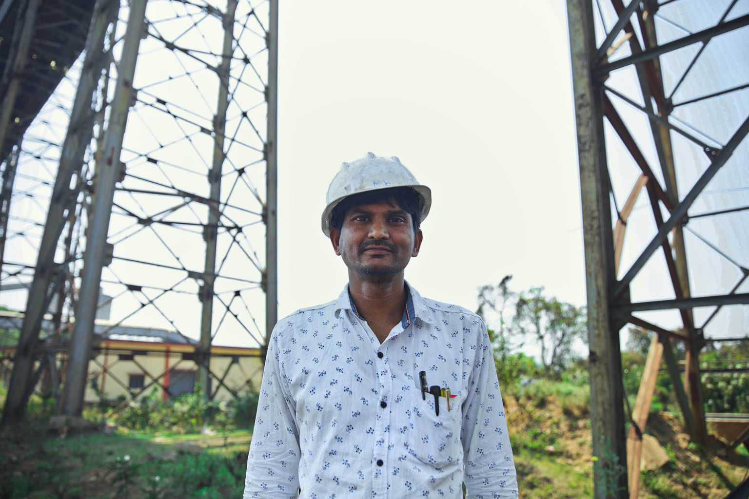 A photo of a man wearing safety helmet