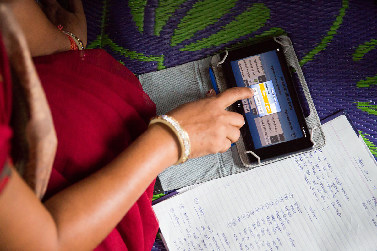 A woman using a digital tablet-digital rights and privacy
