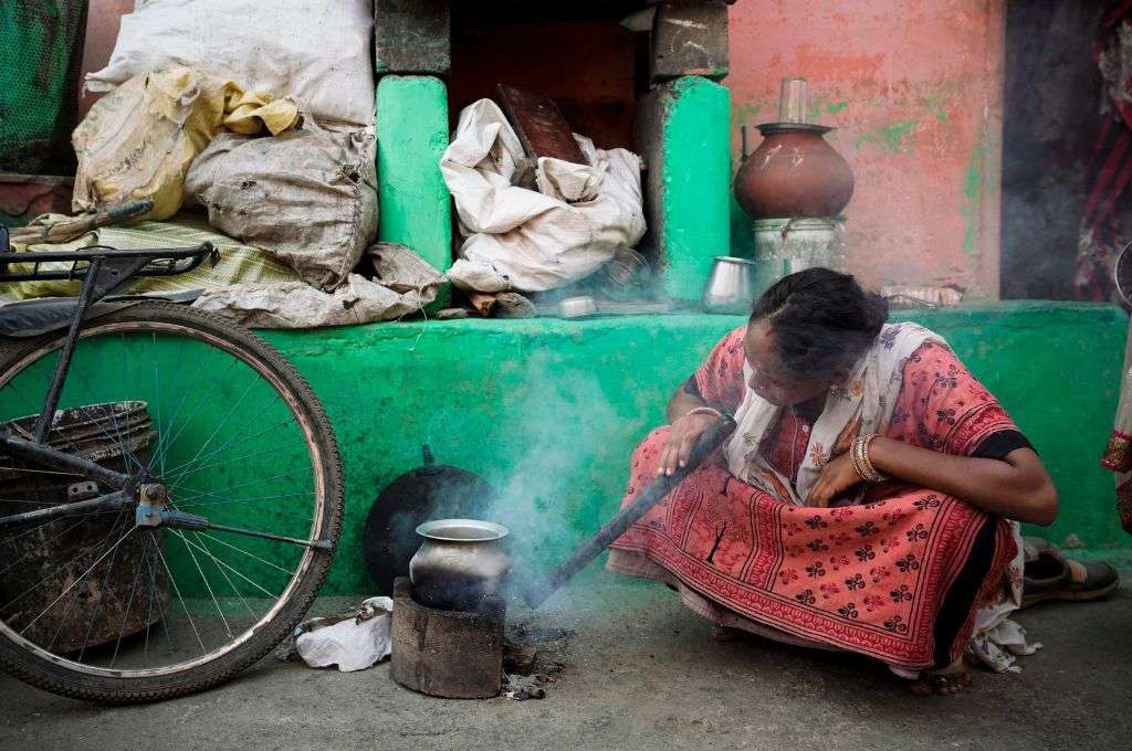 A woman using a firewood chulha_air pollution