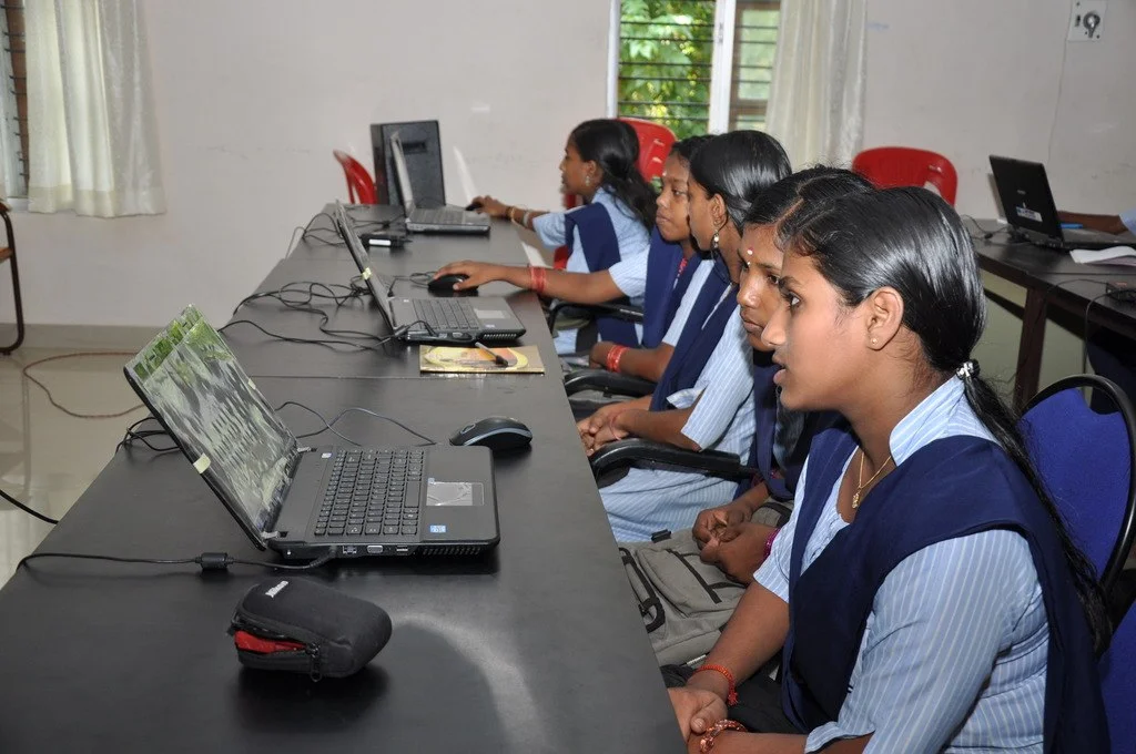 School girls working on laptops-EdTech