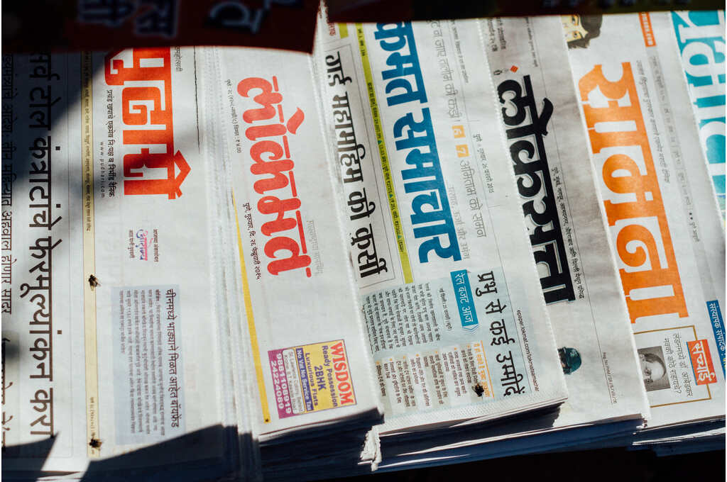 Close up of various Indian newspapers-suicide prevention