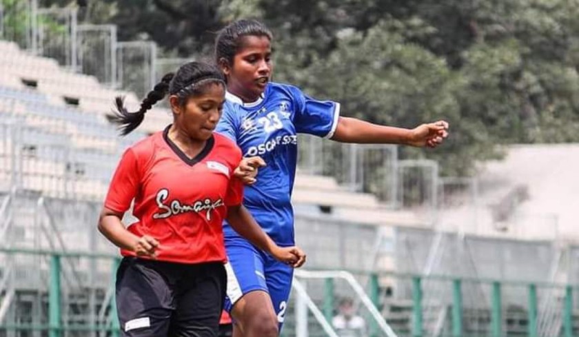 two girls playing football at oscar foundation-gender roles