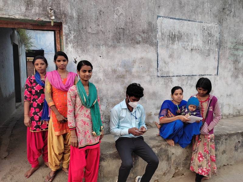volunteers in village doing survey - volunteer engagement