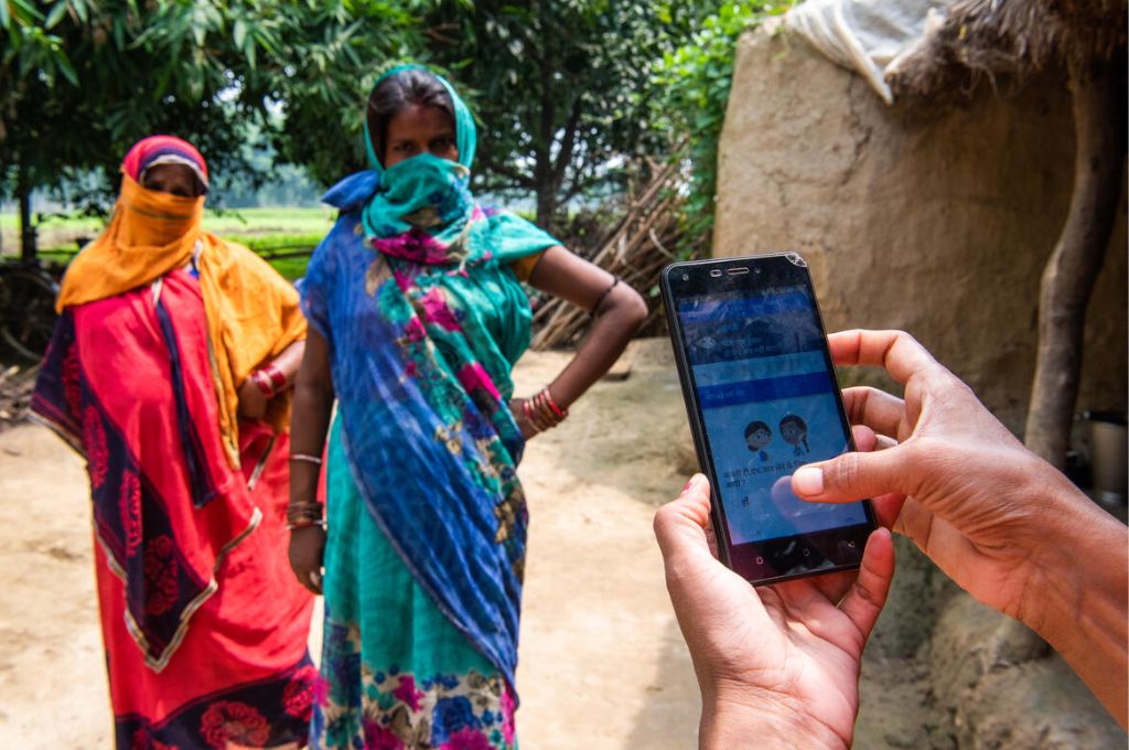 two women standing--nonprofit programme