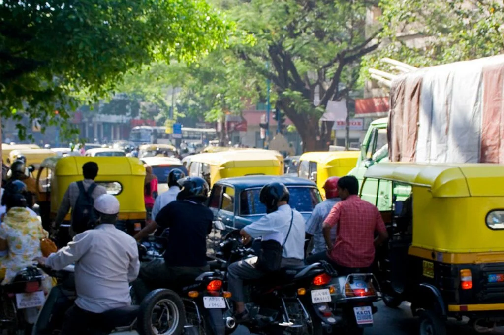 motorbikes and autos stuck in traffic-urban governance